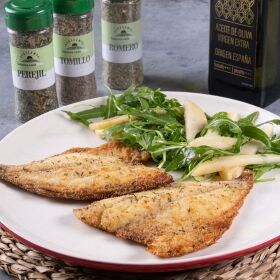 receta dorada crujiente con costra de hierbas y ensalada de rúcula y pera